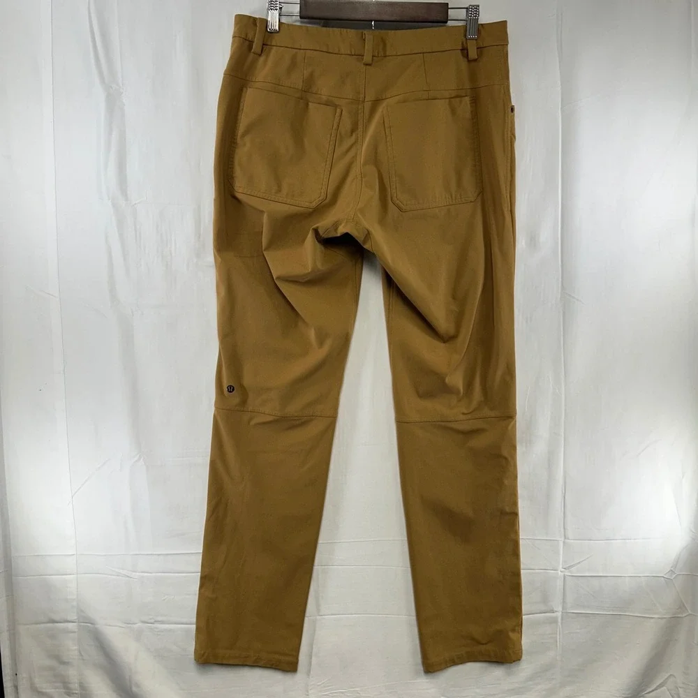 Lululemon ABC Pants Mens 33 Mustard Tan Warpstreme Slim Straight Chino